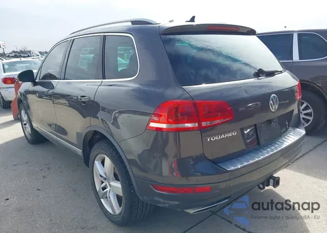 2012 Volkswagen Touareg Tdi Lux z USA, uszkodzony, nr VIN WVGFK9BP7CD002548